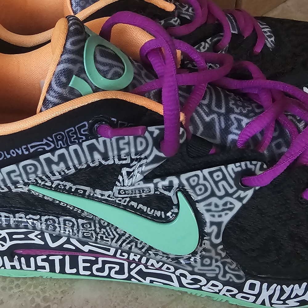 Nike Graphic Sneakers with Mint and Purple Accents